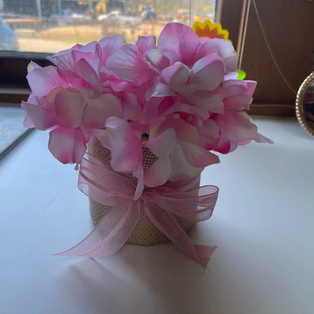 Small Bouquet of Pink Artificial Flowers with a Burlap Pot